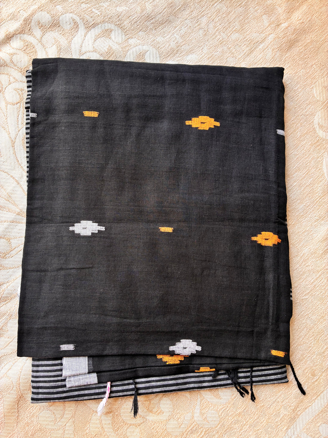 Pure Mul Cotton Saree in Jet Black with Delicate Geometric Buttis & Tasselled Pallu
